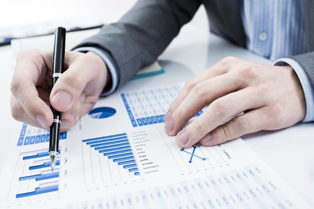 Business professional analyzing data